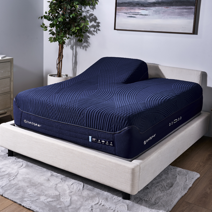 Bedgear M5 Night Ice split head mattress on an adjustable base, lifestyle view