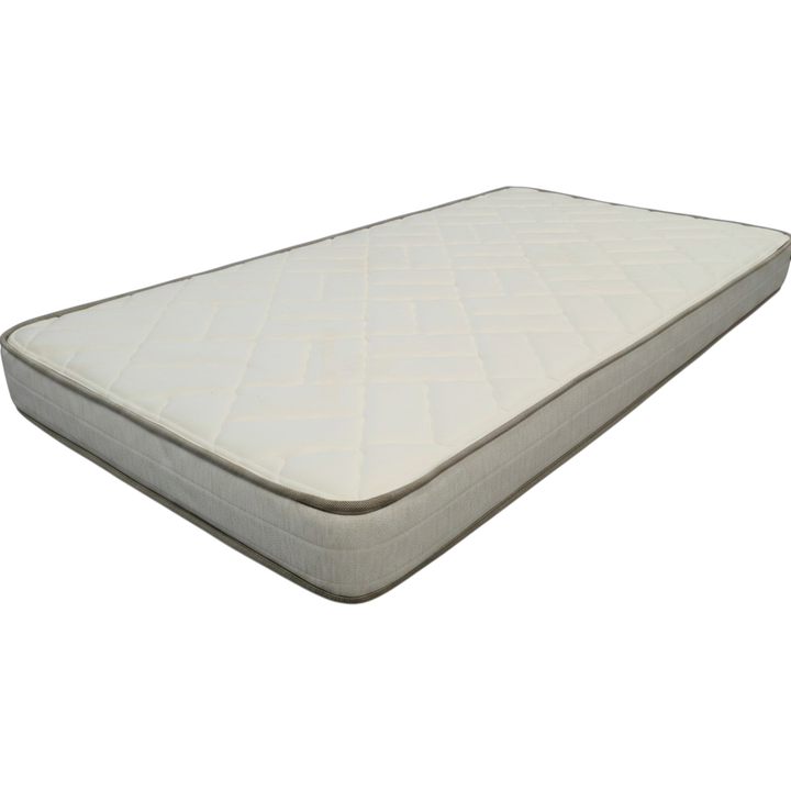 Side angle of a 5 inch custom size all foam RV bunk mattress for campers and travel trailers from Magic Sleeper in Pottstown PA