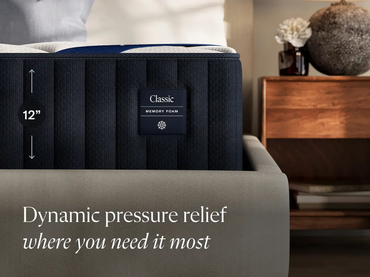 DreamCloud Classic Memory Foam corner showing its extra-firm 12-inch profile and dynamic pressure-relief support