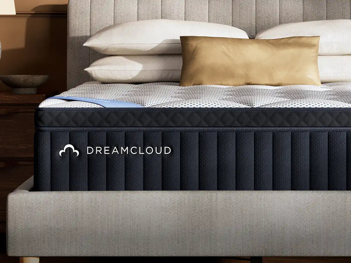DreamCloud Classic mattress on a bed with pillows
