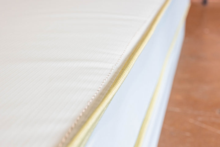 Green Vinyl Tape Edged Mattress