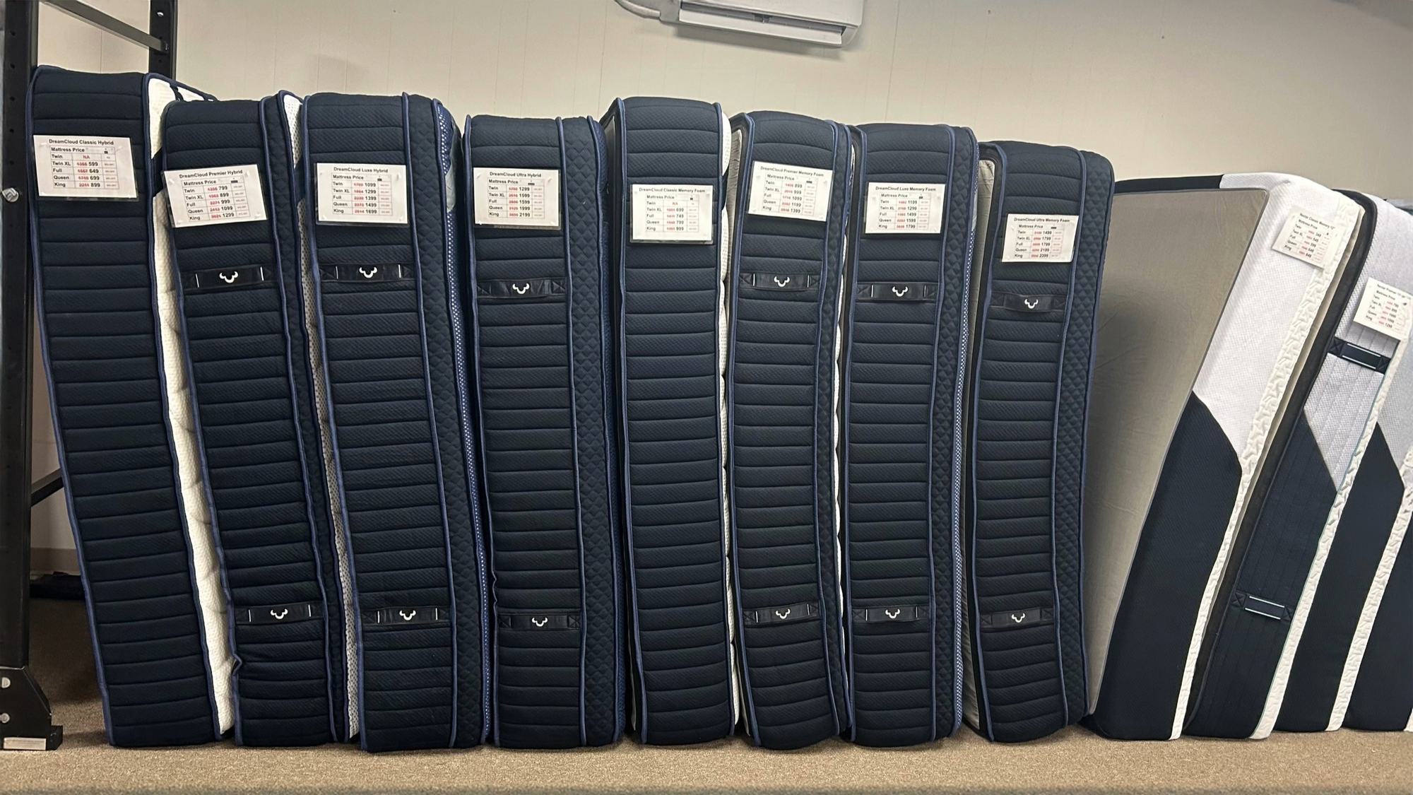 Row of every DreamCloud mattress shown  exclusively at Magic Sleeper to try and compare