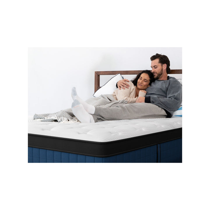 Couple relaxing on a Bear Elite Ultra Hybrid mattress