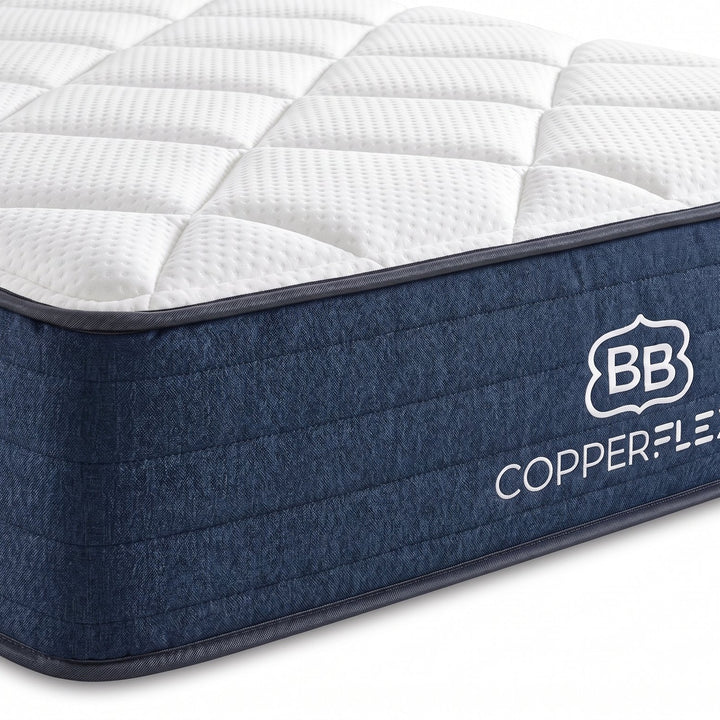 Close-up of CopperFlex Hybrid Essential mattress corner with BB CopperFlex logo