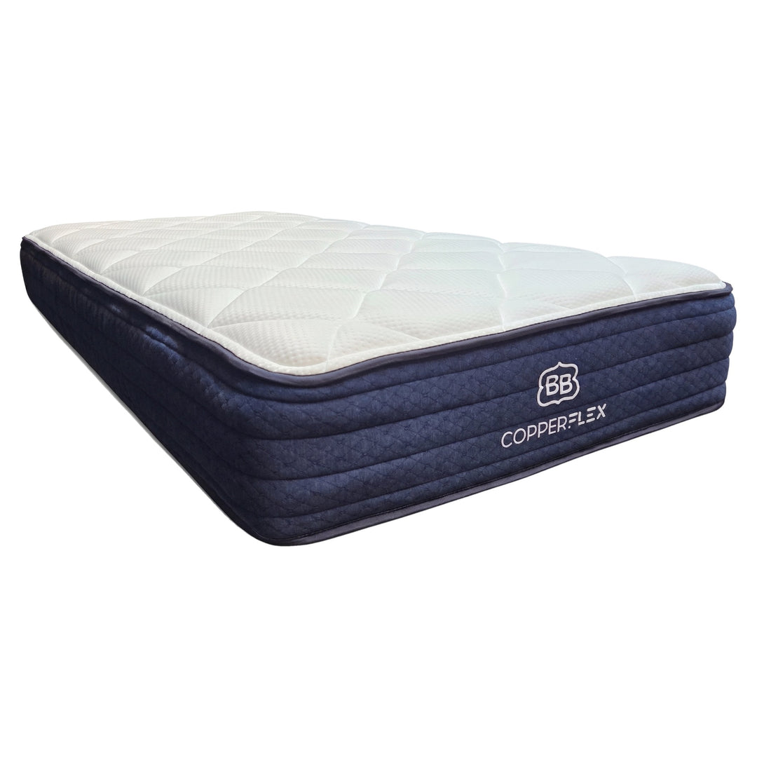 CopperFlex Hybrid Essential mattress side angle showing quilted pillow-top and navy border