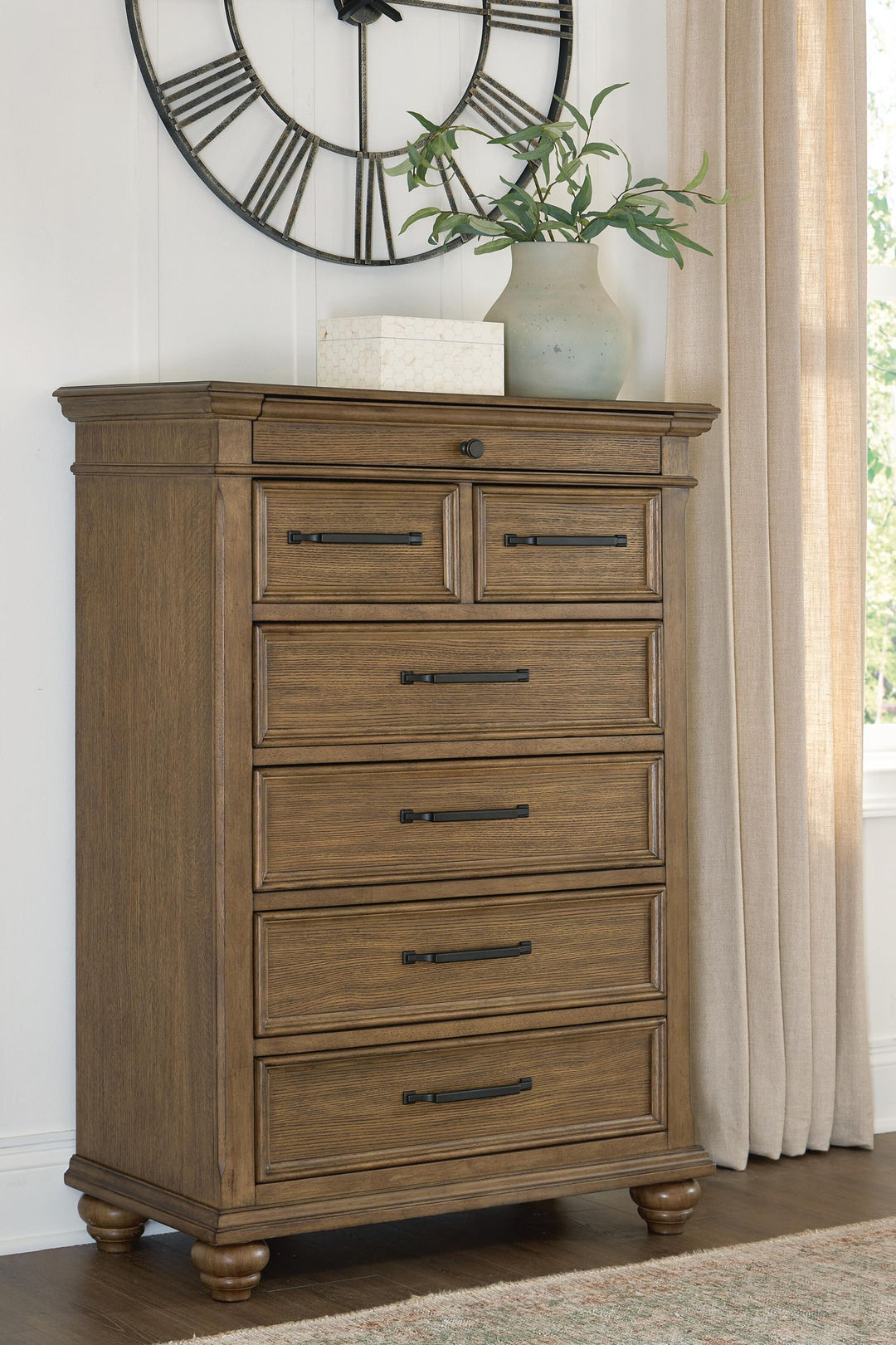 Karallin - Seven Drawer Chest - Medium Brown