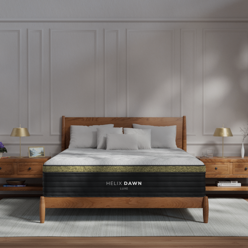 Helix Dawn Luxe firm mattress styled on a wood bed frame in a Pottstown PA bedroom