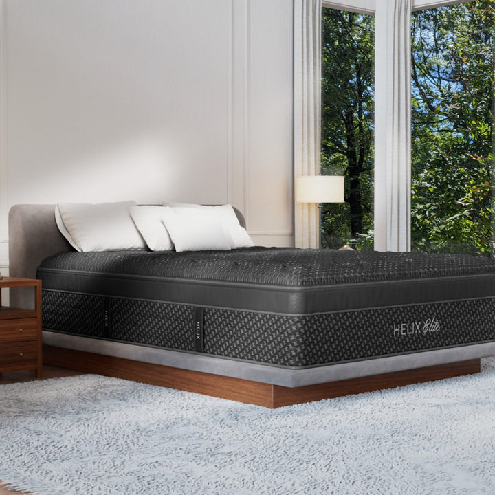 Helix Elite mattress in a styled bedroom setting, corner view