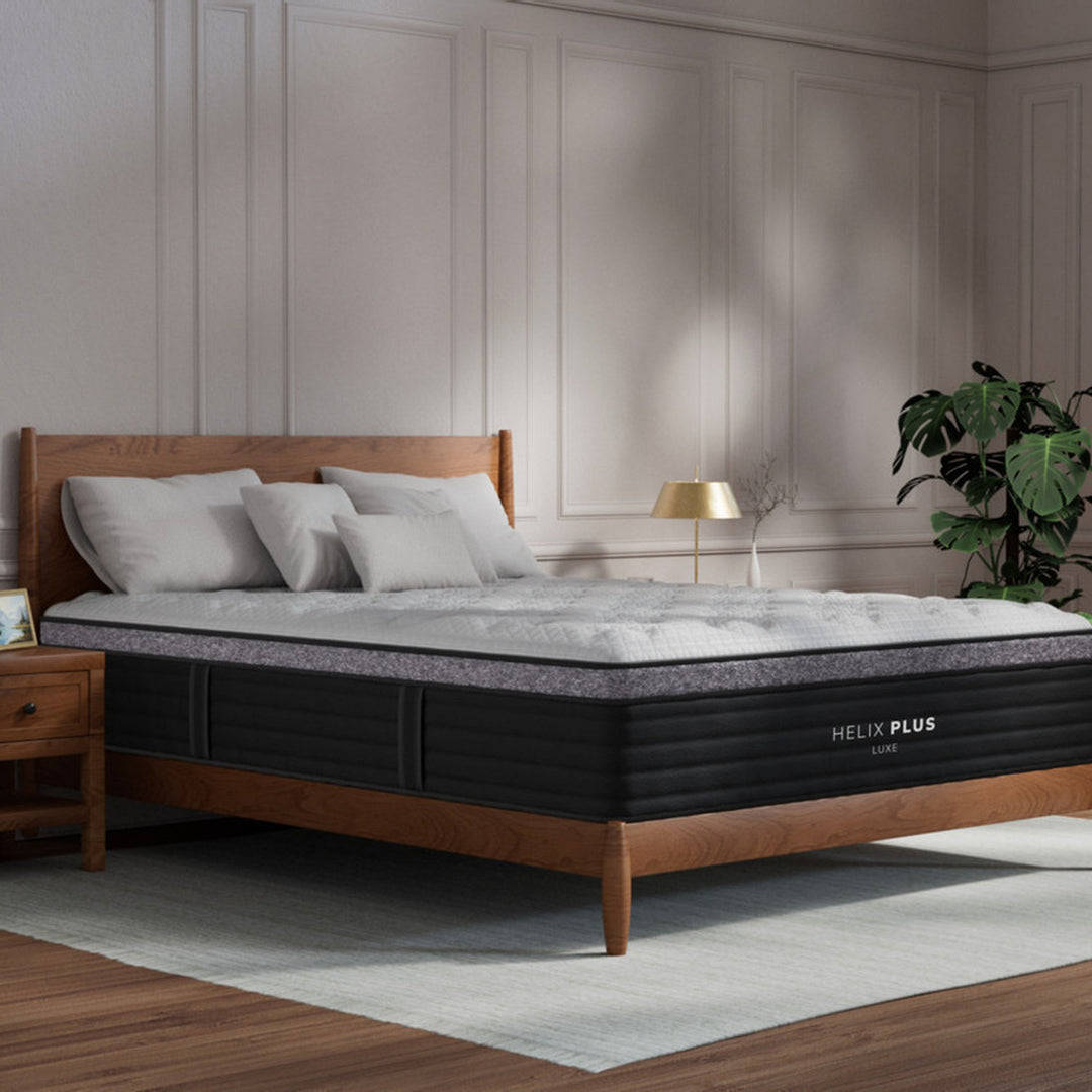 Helix Plus Luxe mattress in a styled bedroom setting, corner view