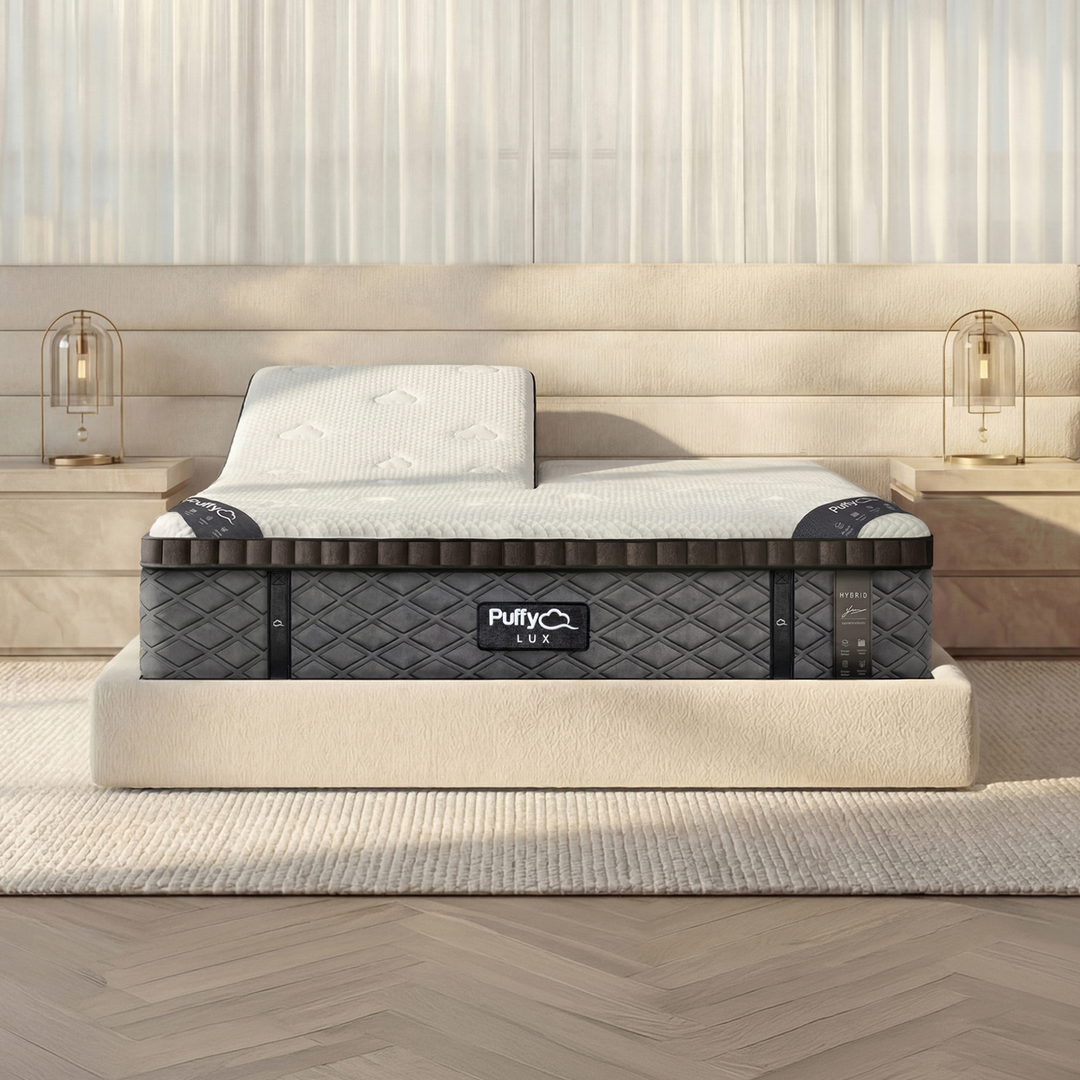 Puffy Lux Hybrid mattress in split head king configuration styled in a contemporary bedroom, available at Magic Sleeper in Pottstown, PA.