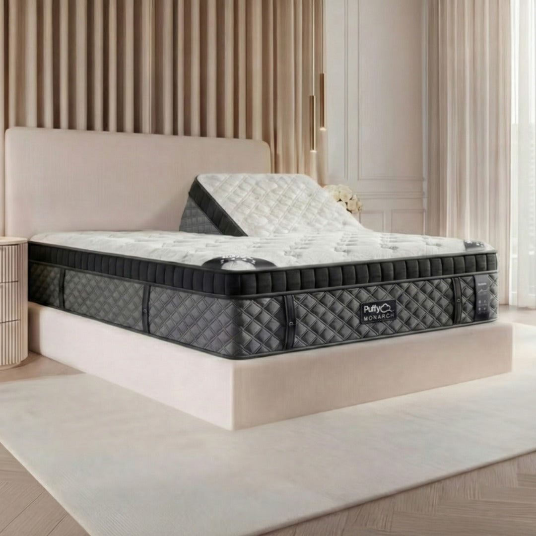 Luxury bedroom suite featuring the high profile Puffy Monarch mattress