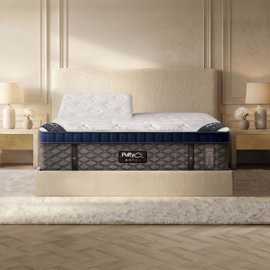 Puffy Royal Hybrid mattress in split head king configuration styled in a luxury bedroom, available at Magic Sleeper in Pottstown, PA.