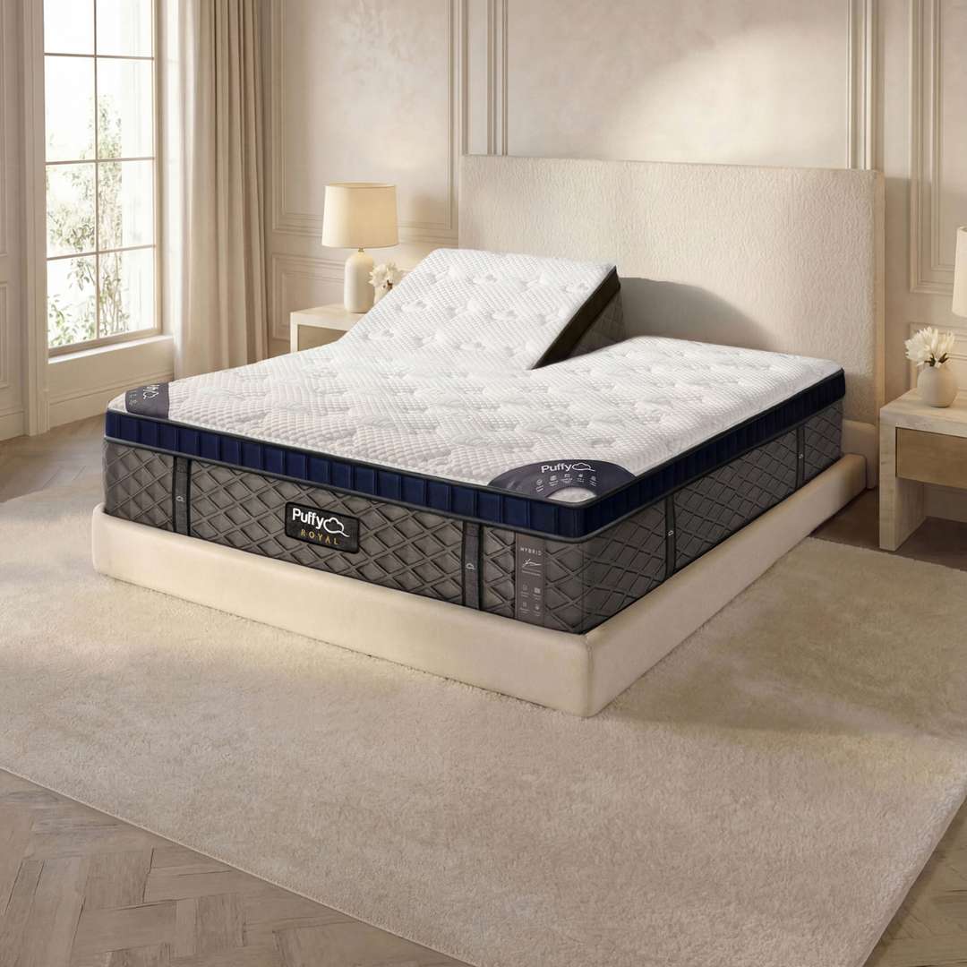 Split head Puffy Royal mattress shown on an adjustable base with both head sections raised, ideal for couples with different sleep preferences.