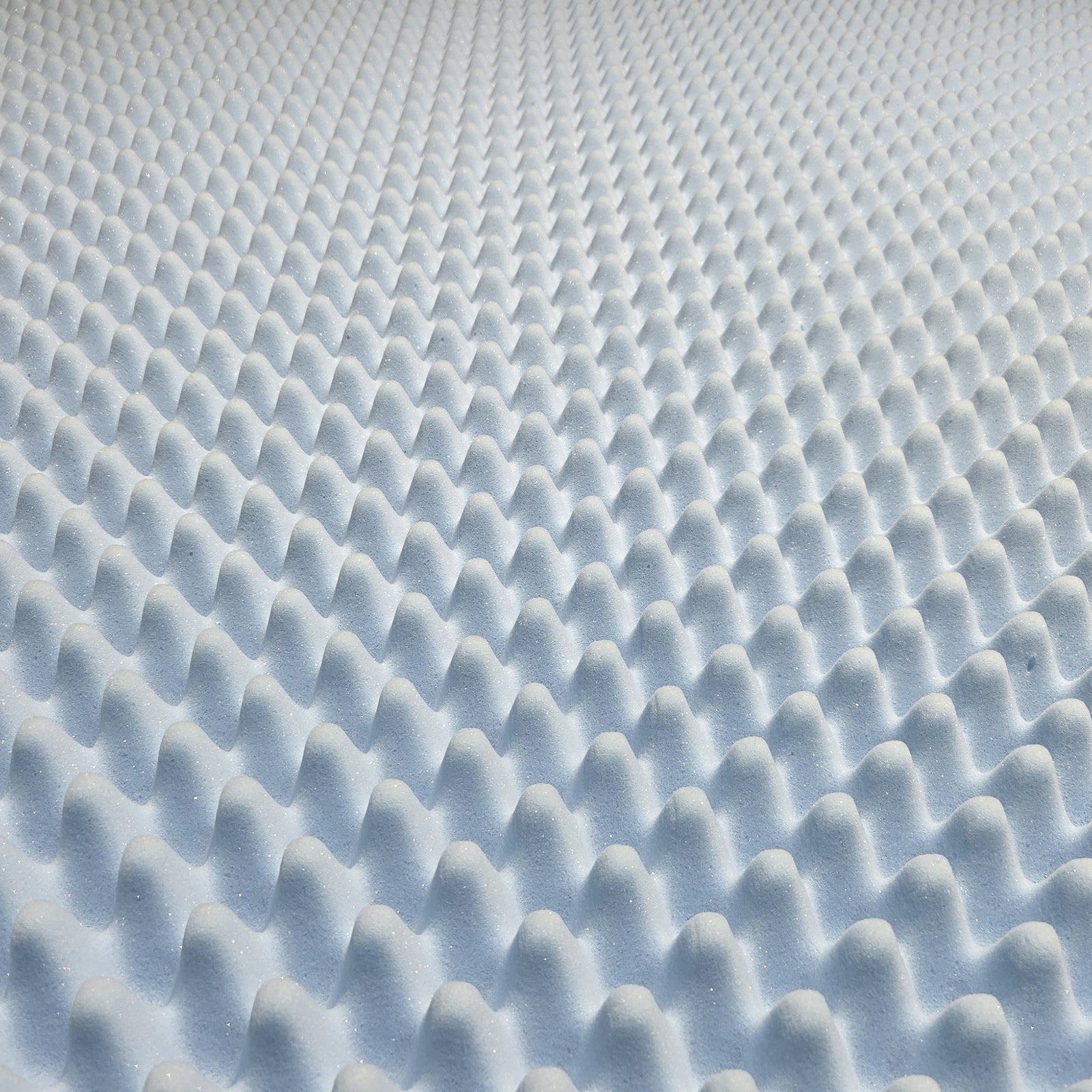 Top-down view of blue egg crate foam replacement topper for Sleep Number beds
