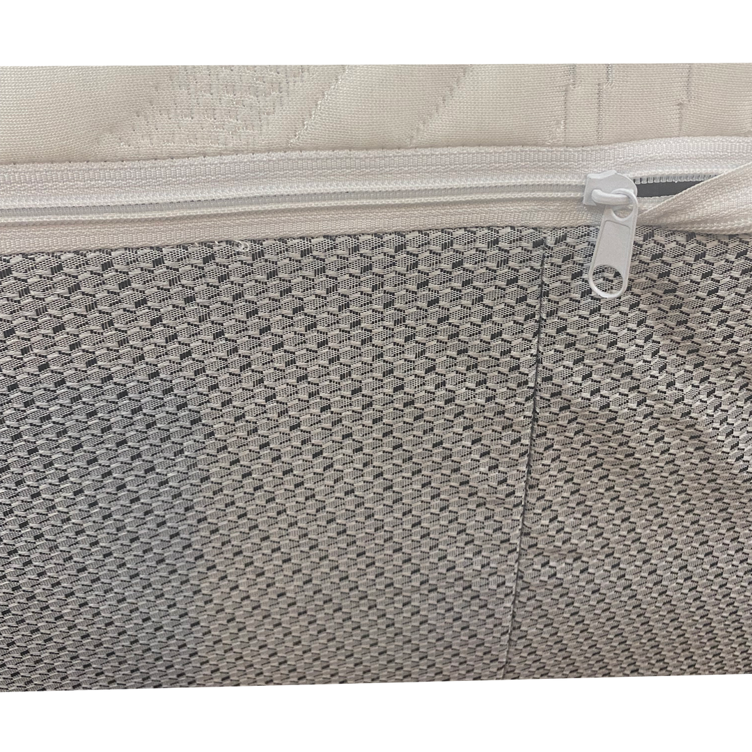 Zipper detail on Sleep Number replacement cover where stretch knit top meets durable gray side panel