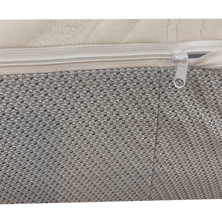 Zipper detail on Sleep Number replacement cover where stretch knit top meets durable gray side panel